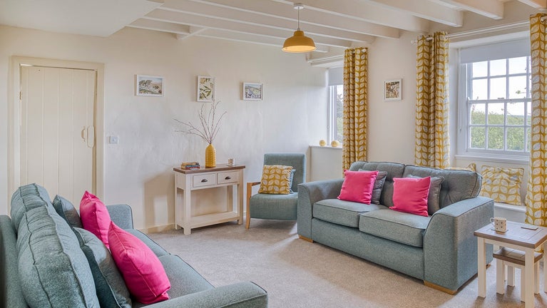 The sitting room at Ty'n y Parc Farmhouse, Gwynedd, Wales